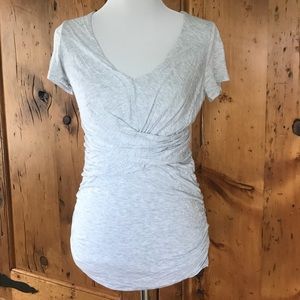 Anthropologie Bordeaux twist front tee.